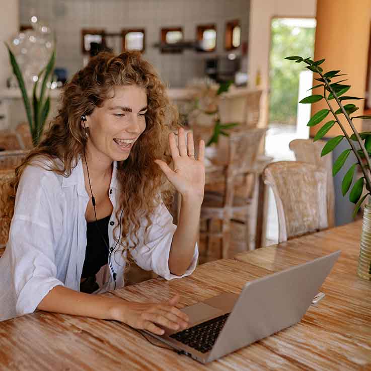 seo-coaching-with-kristin-morrison-call Woman waving at laptop